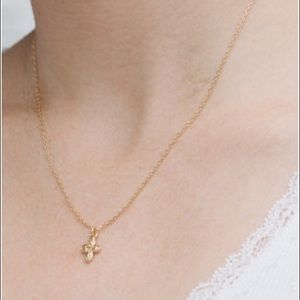 brandy melville mini cross gold necklace
